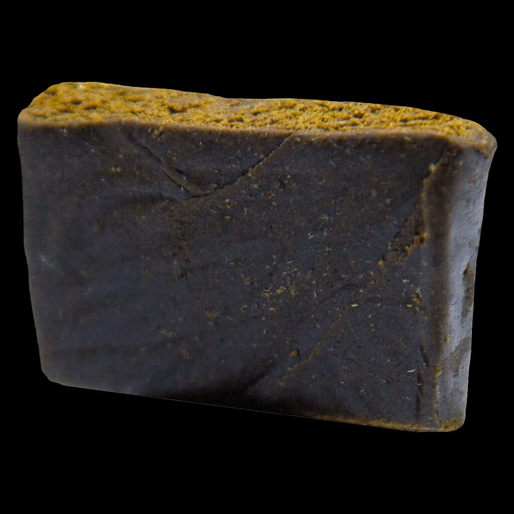 MTL Cannabis Wes' Coast Kush Hash, dark cannabis concentrate with gold dust texture
