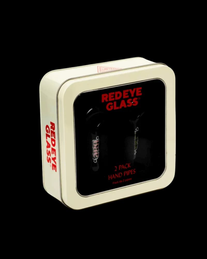 Red Eye Glass 2-pack hand pipes in cream-colored retail box with black window display and red branding