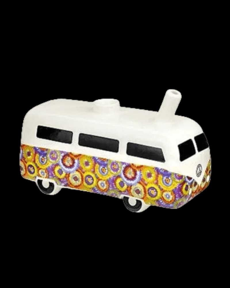 Fashioncraft vintage bus pipe with white ceramic body and colorful donut-pattern band, cannabis smoking accessory