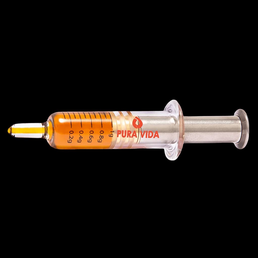 Pura Vida Sativa Honey Oil Dispenser syringe with orange barrel and measurement markings, cannabis concentrate applicator