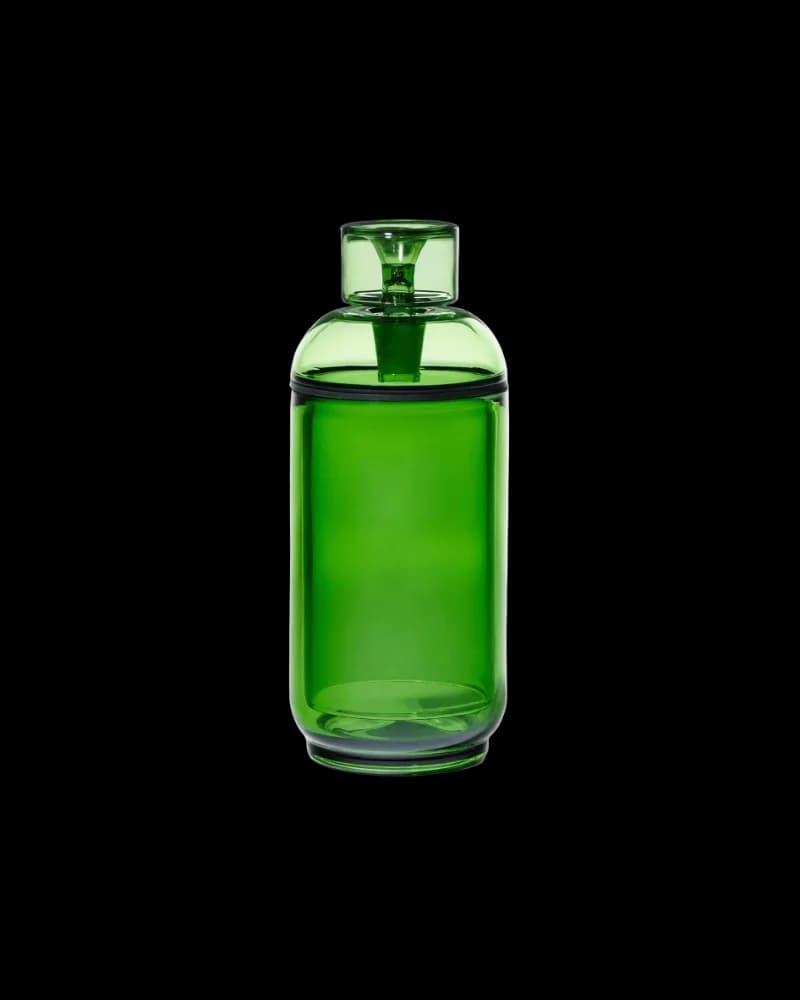 Empty green glass cannabis tincture bottle with dropper cap and black collar ring