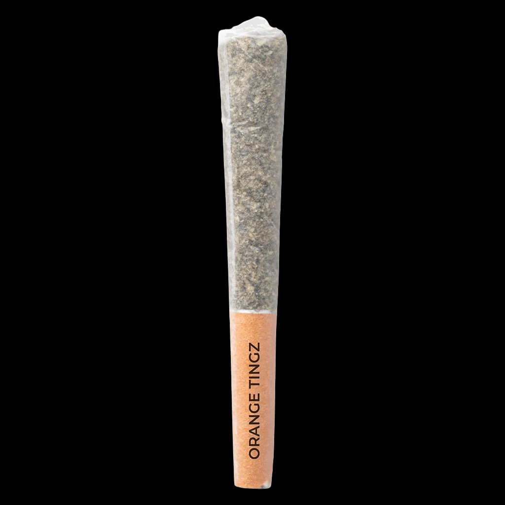 Pistol and Paris Orange Tingz pre-roll with visible cannabis flower and orange-tinted paper tip
