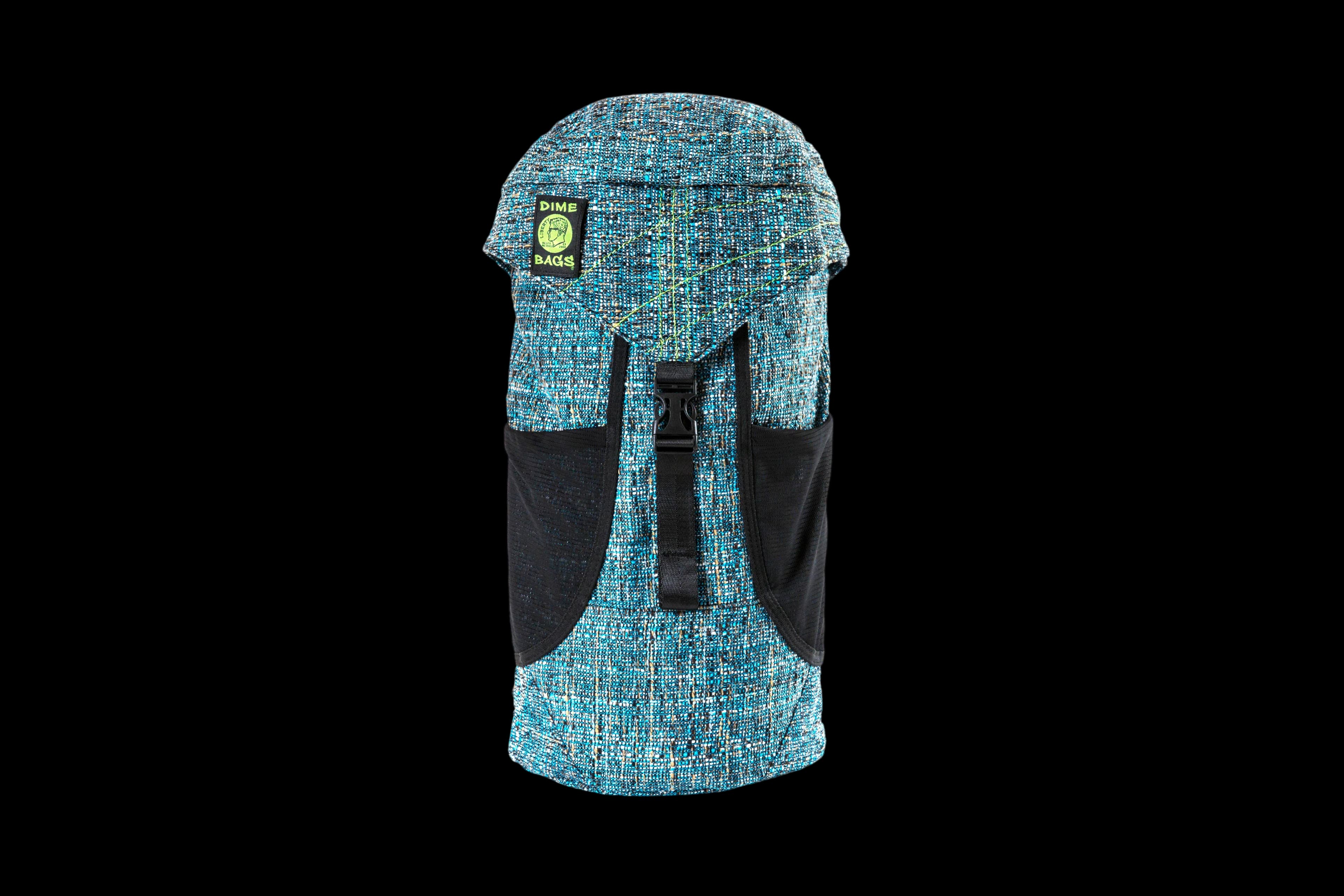Dime Bags Conversion Tube Bag in turquoise textured fabric with black straps and hardware, designed for 18" glass storage
