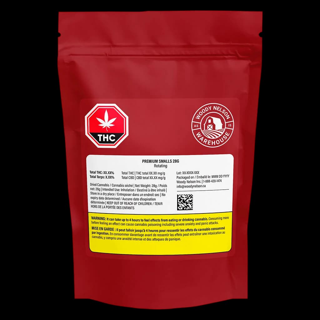 Pochette de 28 g de petites fleurs de cannabis séché Woody Nelson Premium Smalls, emballage rouge avec symbole THC et étiquette d'avertissement jaune de Santé Canada