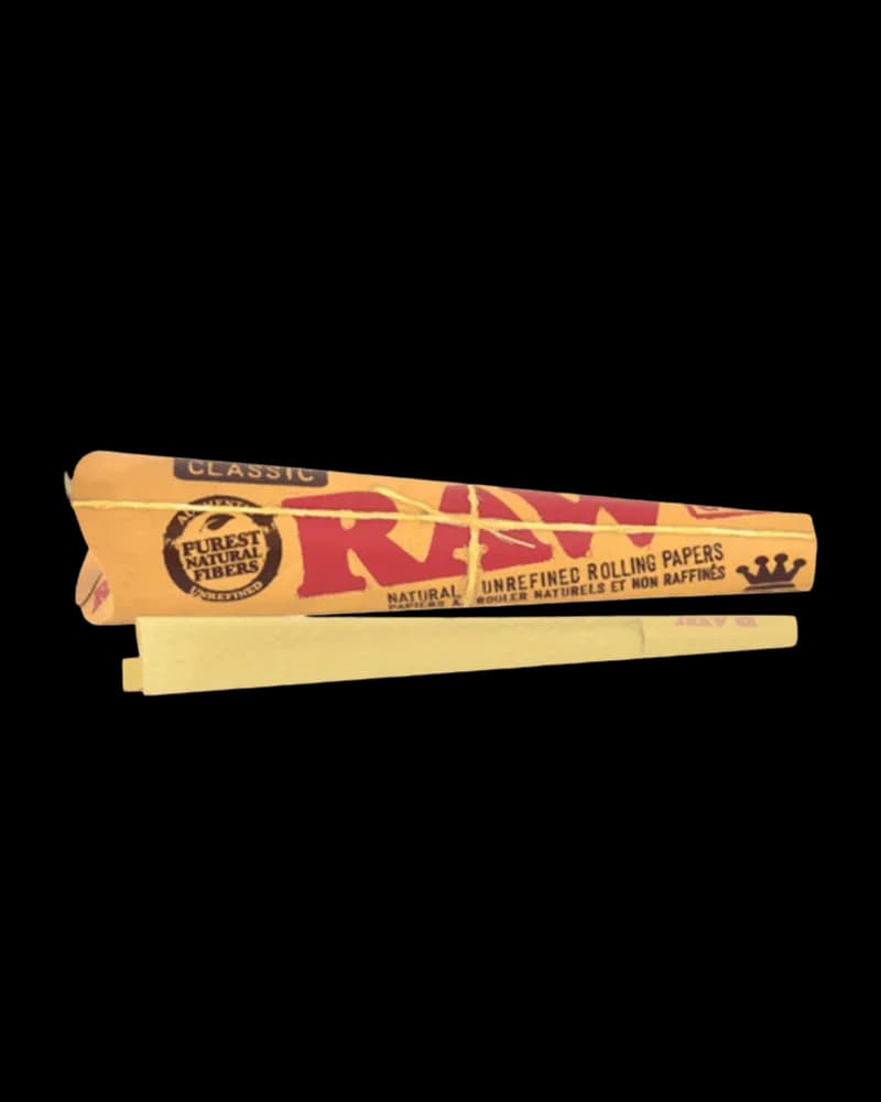 RAW Classic King Size rolling papers and unbleached rolling cones, 3-pack, displayed with packaging showing natural unrefined rolling supplies