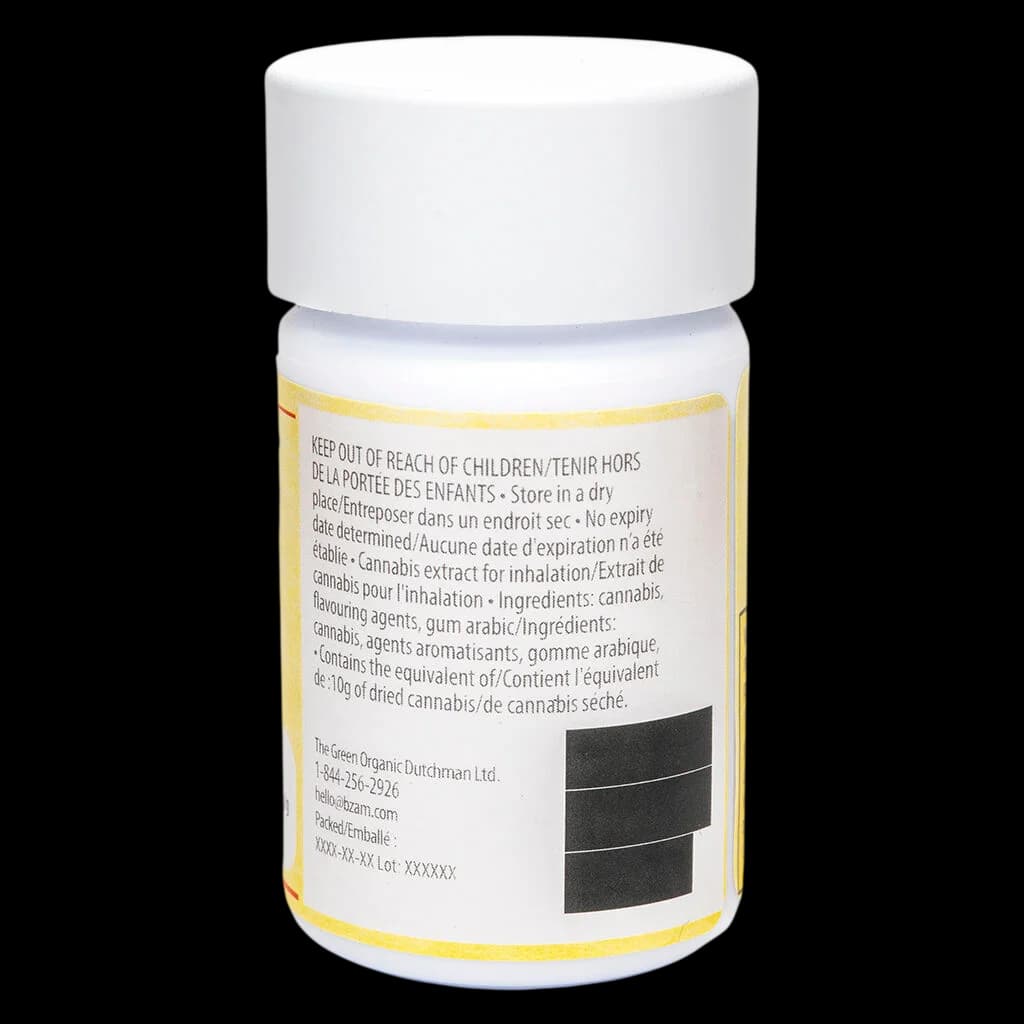 High Stick Puck Drop Pineapple cannabis extract inhalation product in white jar with yellow label, rear packaging showing bilingual warnings and ingredients