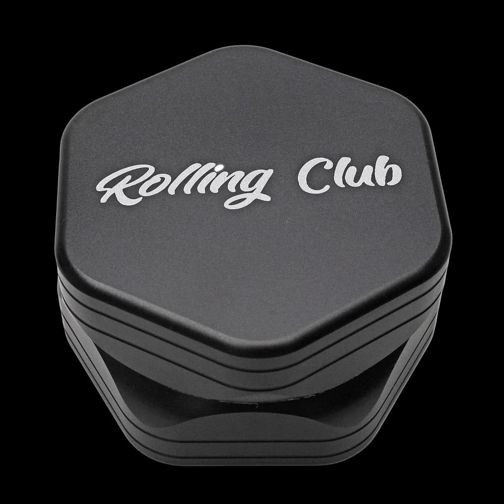 Rolling Club black grinder with white logo text on lid, multi-chamber design