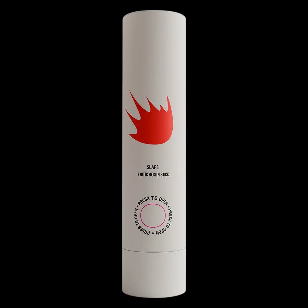 SLAPS Exotic Rosin Stick cannabis concentrate in white cylindrical tube with red flame logo