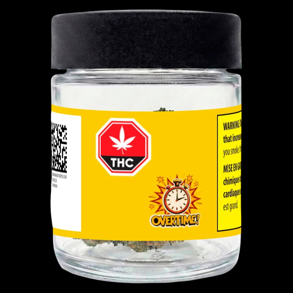 OVERTIME Clock In dried flower cannabis in clear glass jar with black cap and yellow label featuring THC warning symbol