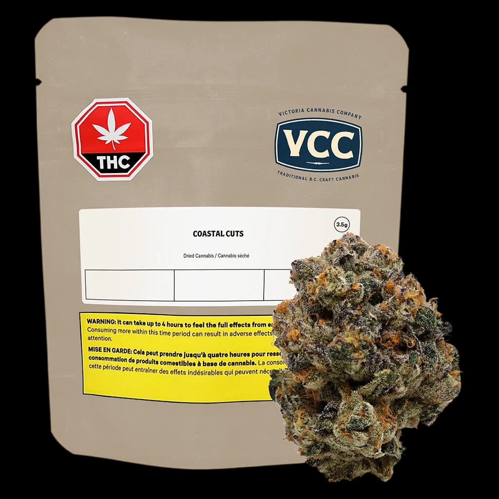 Victoria Cannabis Company Coastal Cuts 3.5g dried flower with dense green and orange buds displayed beside kraft pouch packaging