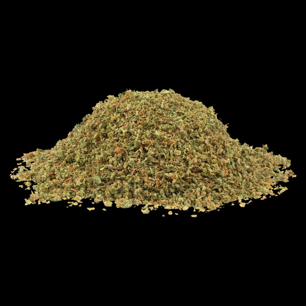 Fleur séchée de cannabis Gnarberry SHRED, texture finement moulue aux teintes vertes et brunes