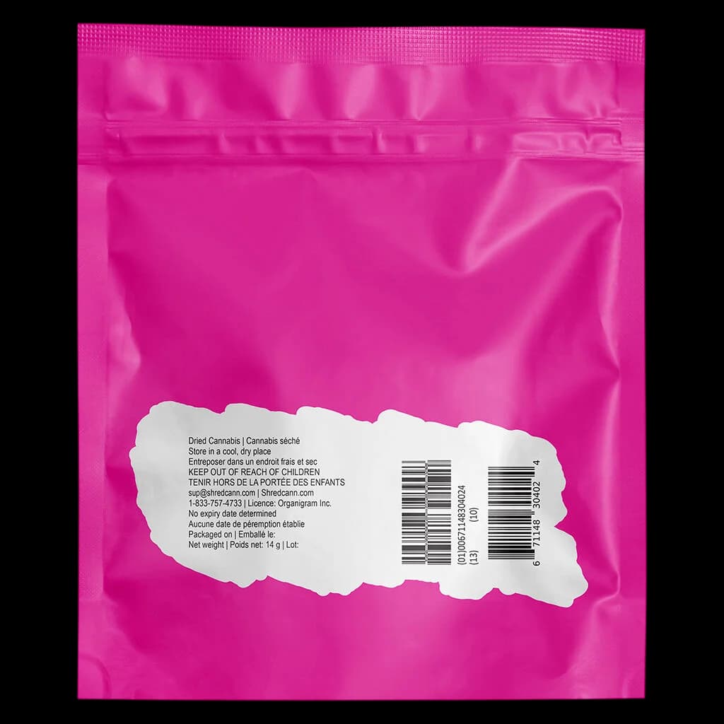 Shred Gnarberry 14g dried cannabis flower in bright pink resealable pouch, rear label visible with regulatory text and barcodes