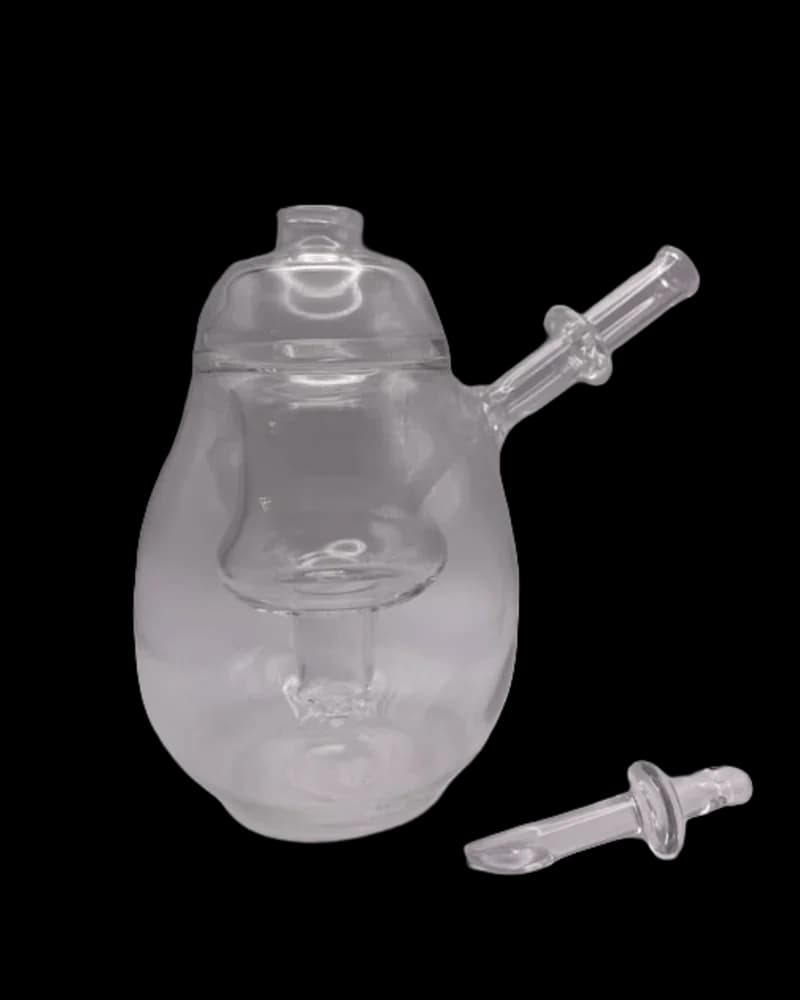 Clear glass cannabis concentrate banger with dab tool and carb cap accessory set