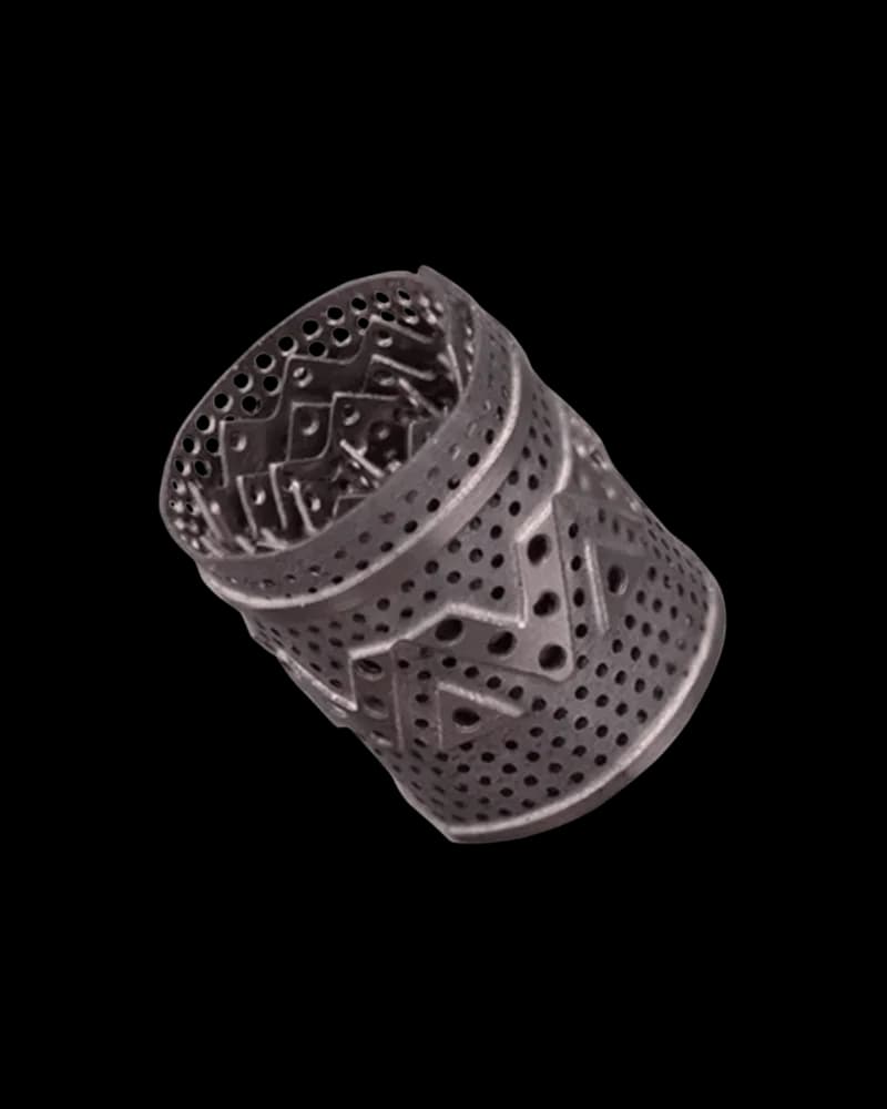 Dynavap Dynacoil replacement heating chamber, black perforated metal cylinder with internal ribbed design