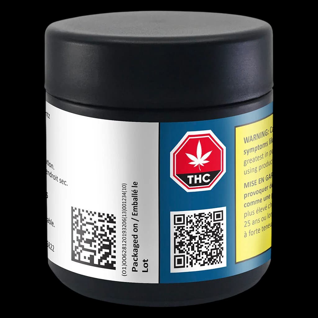 DEALR 100K cannabis dried flower in black glass jar with child-resistant lid, showing THC warning symbol and QR code on label