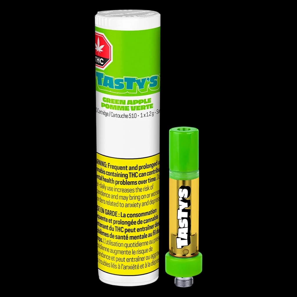 Tasty's Green Apple 510 cannabis vape cartridge with packaging and detached cart showing green cap and gold oil chamber