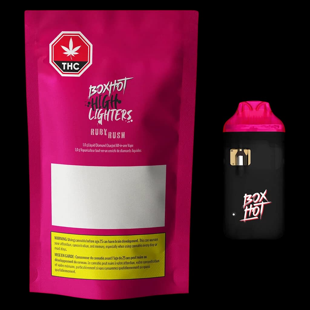 BOXHOT Ruby Rush Liquid Diamond Charged All-in-One vape 1.0g with magenta packaging and matching device