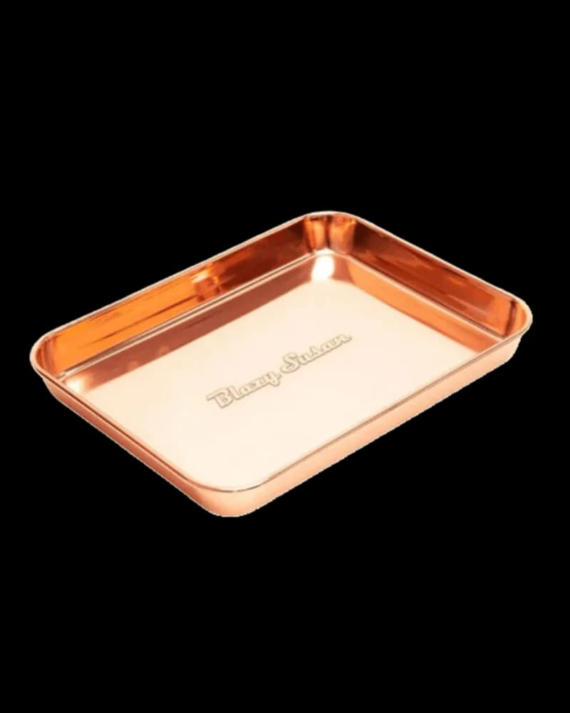 Blazy Susan stainless steel rolling tray in rose gold with cream-colored base