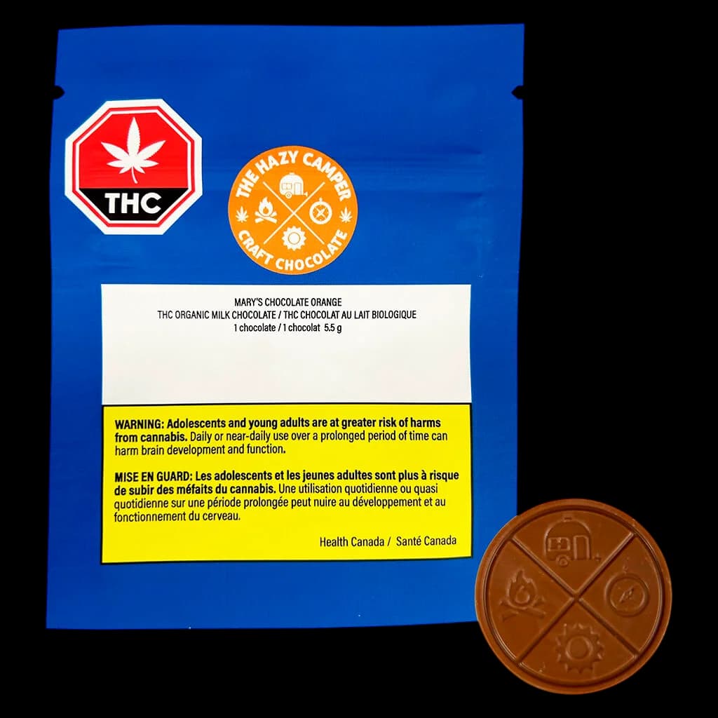 Le chocolat au lait biologique THC Mary's Chocolate Orange de The Hazy Camper, 1 chocolat de 5,5 g, avec l'emballage du produit et un segment individuel illustrés
