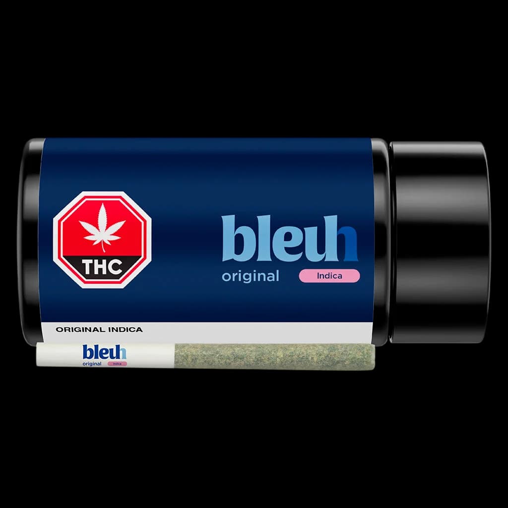 Pré-roulé Indica Original Bleuh avec emballage tube à l'effigie de la marque et cigarette de cannabis individuelle affichée devant