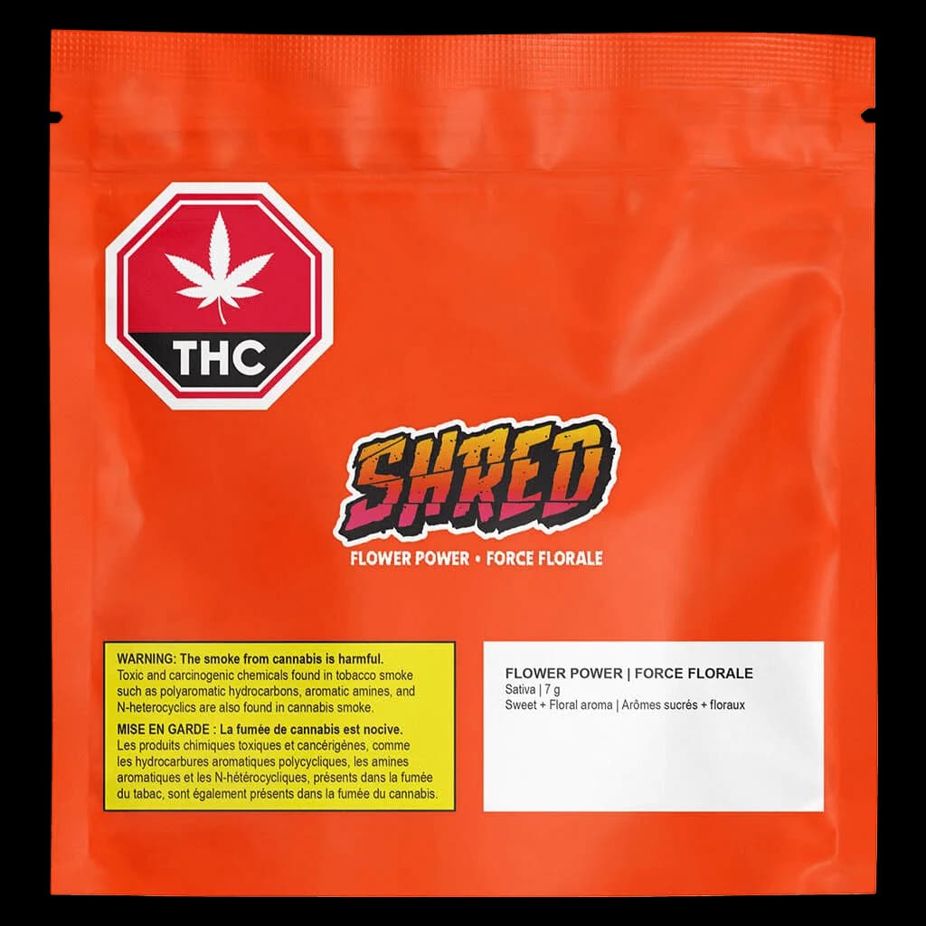 Emballage de 7 g de fleurs séchées Flower Power de SHRED avec fond rouge, symbole d'avertissement THC et étiquette d'avertissement sanitaire bilingue