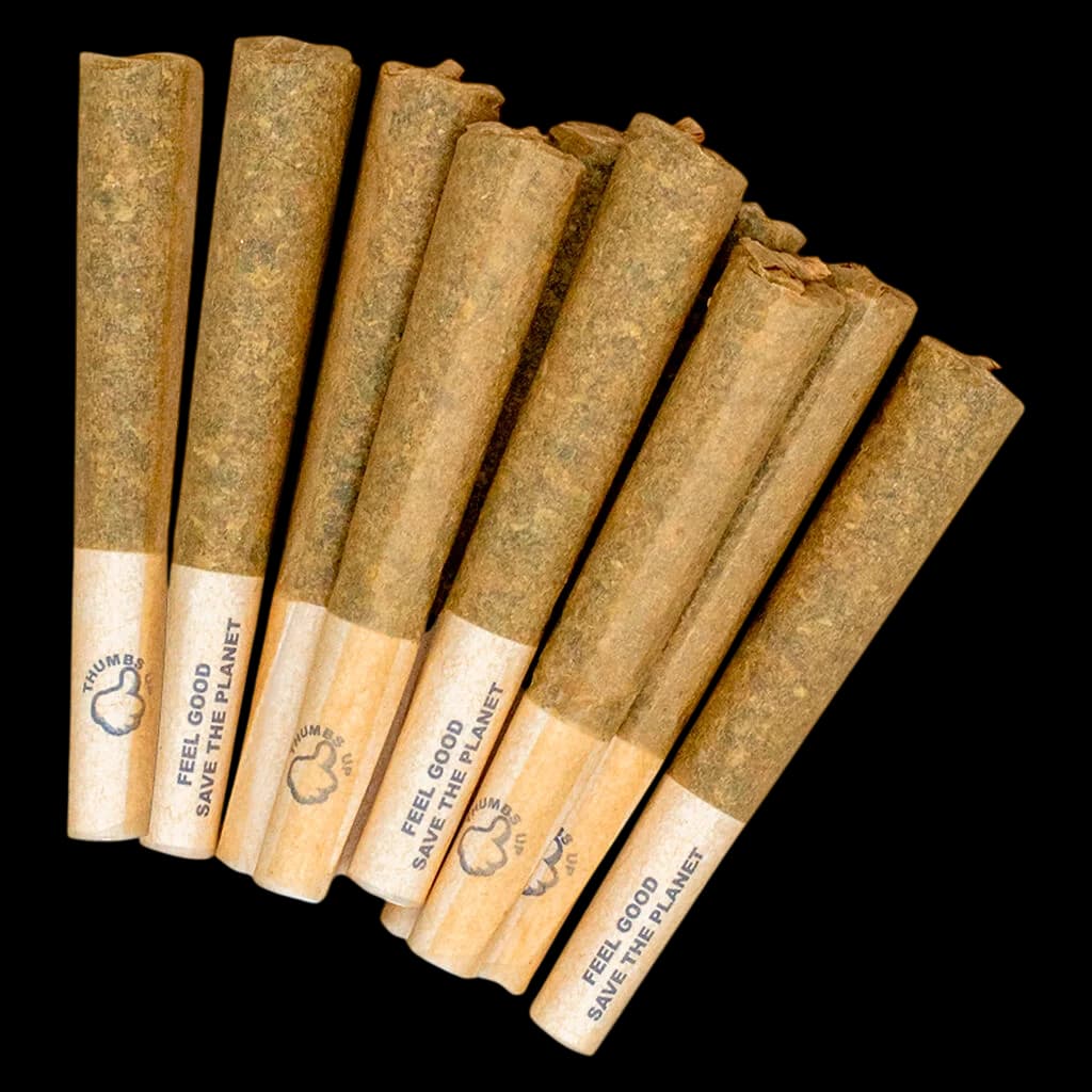 Pré-roulé Indica Thumbs Up avec papier naturel et logo visible dans la section inférieure