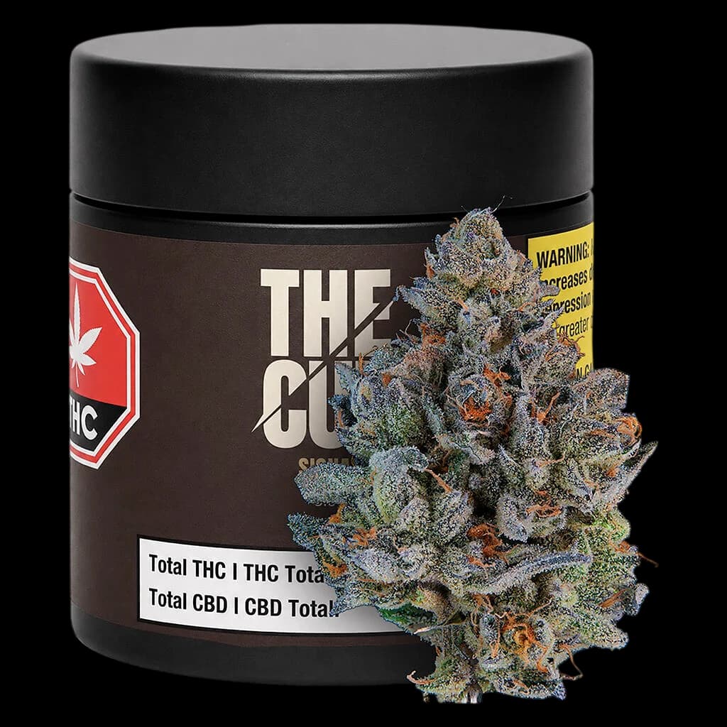 The Cut Signal dried flower cannabis in glass jar with visible trichomes and orange pistils