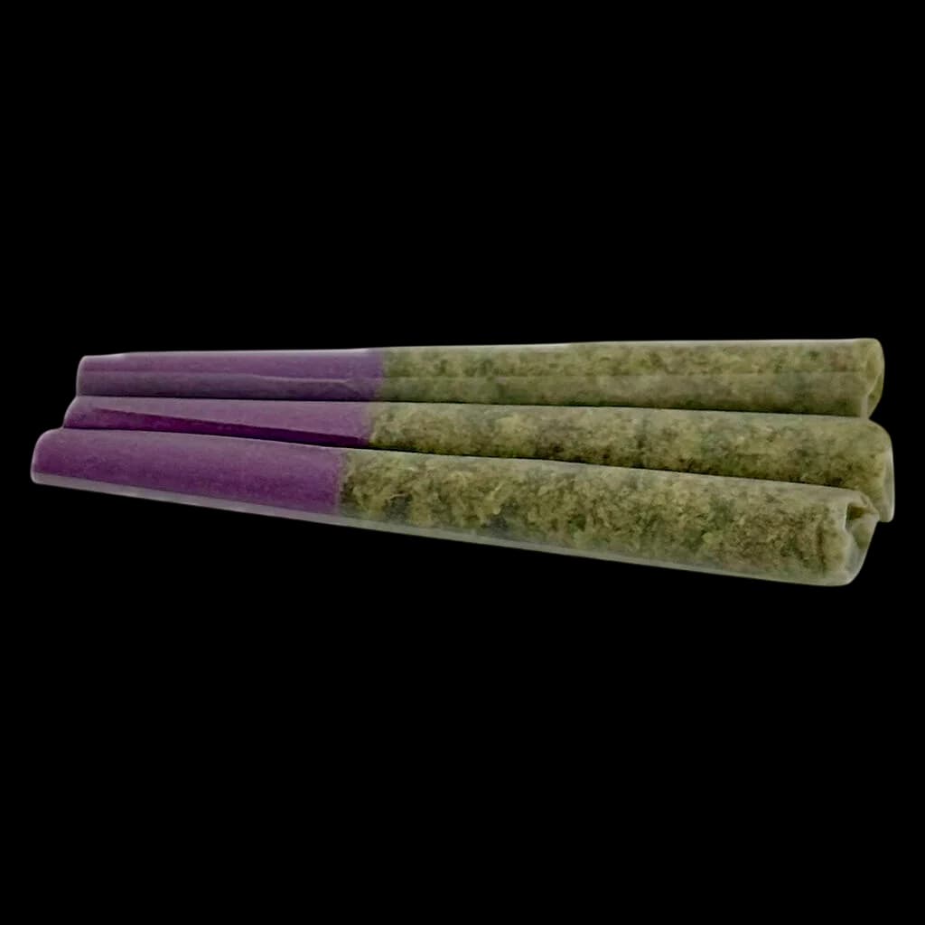 Emballage de préroulés Lamb of God par Headstone Cannabis, contenant trois préroulés de cannabis avec papier violet et fleur de cannabis verte