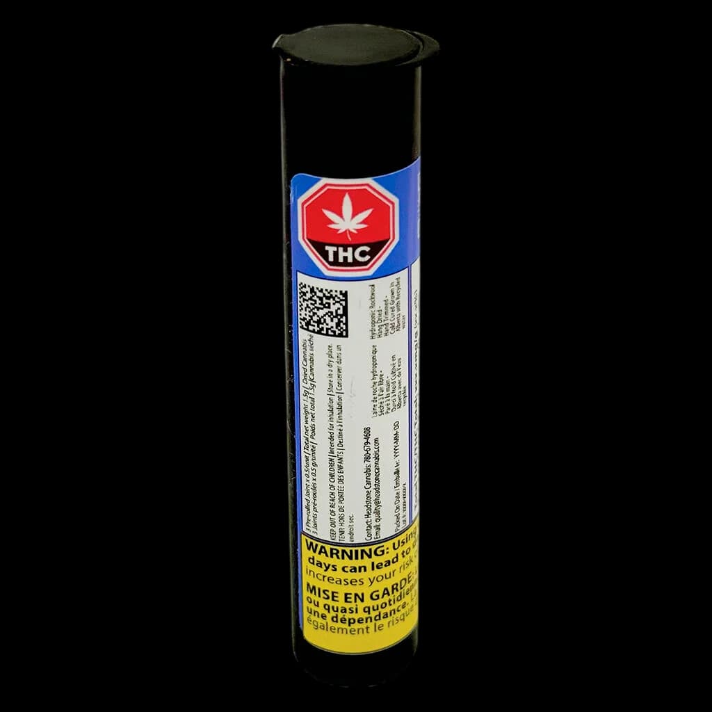 Tube de pré-roulé Lamb of God de Headstone Cannabis, étiquette THC bleue et rouge, capuchon noir et bandeau d'avertissement jaune de Santé Canada