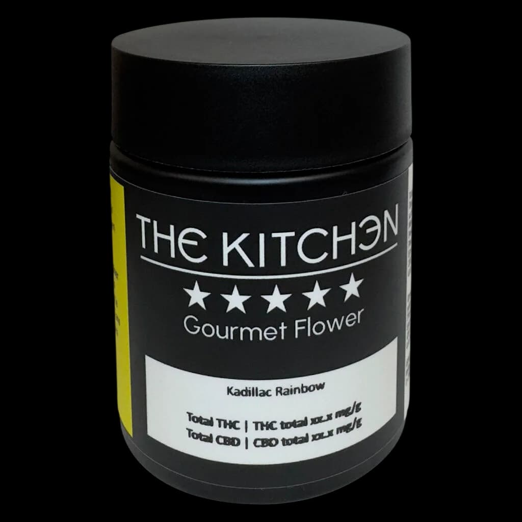 The Kitchen Kadillac Rainbow dried flower in black glass jar with white label and yellow accent stripe