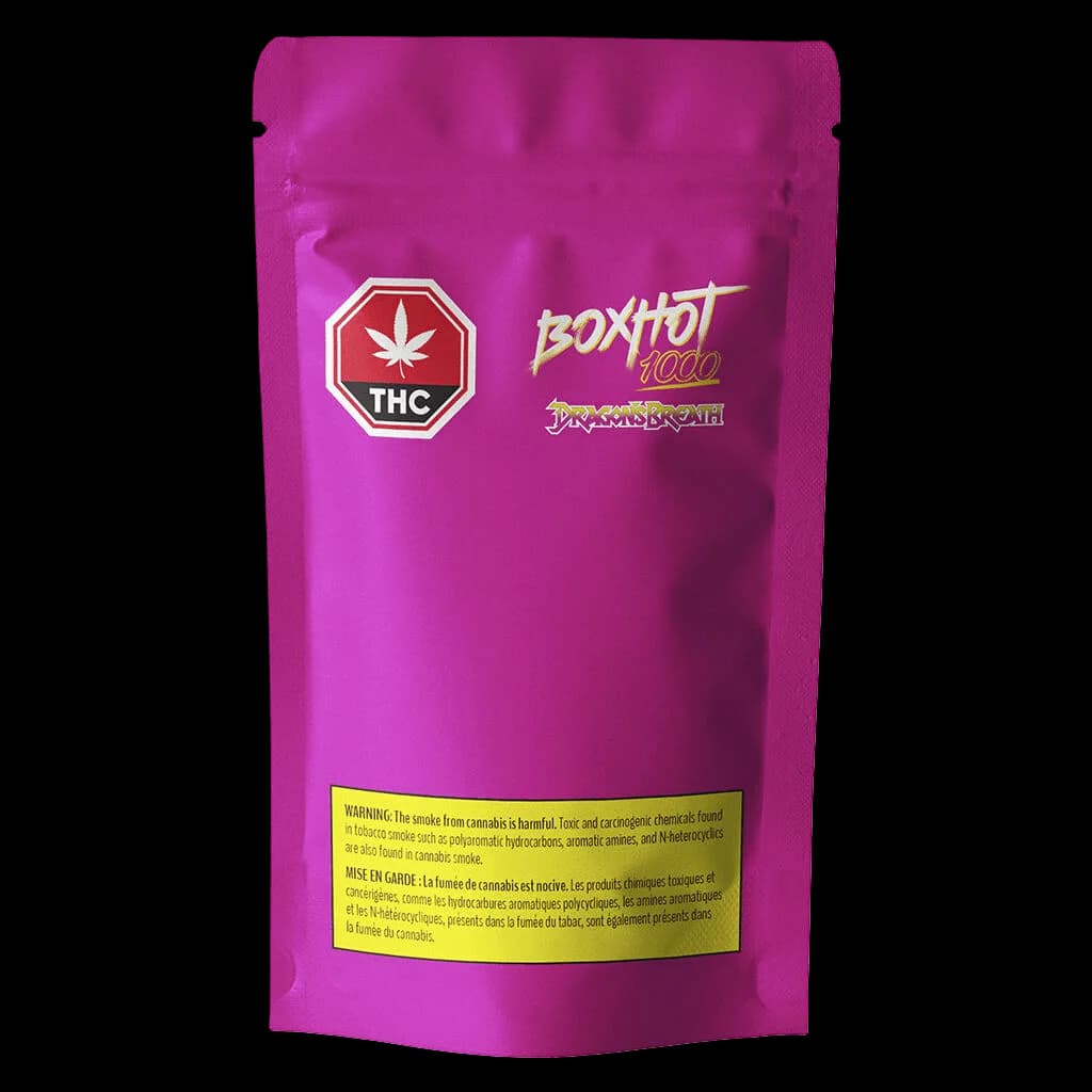 Cartouche de vapotage BOXHOT 1000 Dragon's Breath à filetage 510 dans une pochette magenta avec logo THC et étiquette d'avertissement sanitaire jaune
