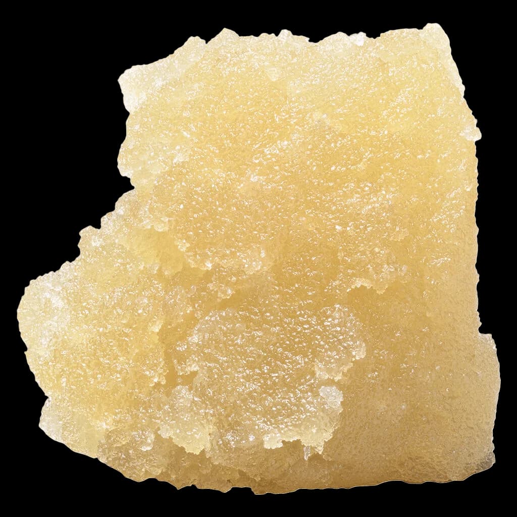 Big Steal Live Resin Concentrate, pale yellow cannabis concentrate with crystalline texture