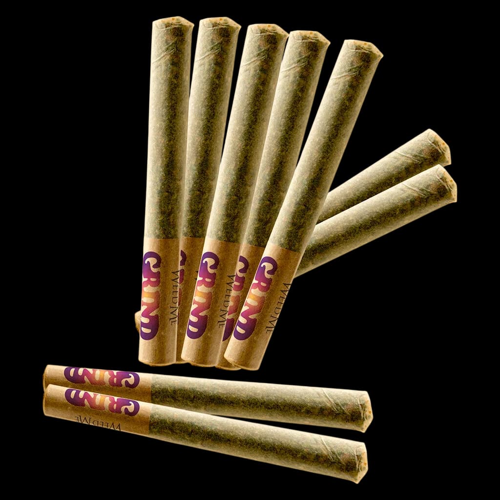 Weed Me Grind Indica Straights pre-roll pack with 9 cannabis pre-rolls displayed, purple and gold branded bands visible