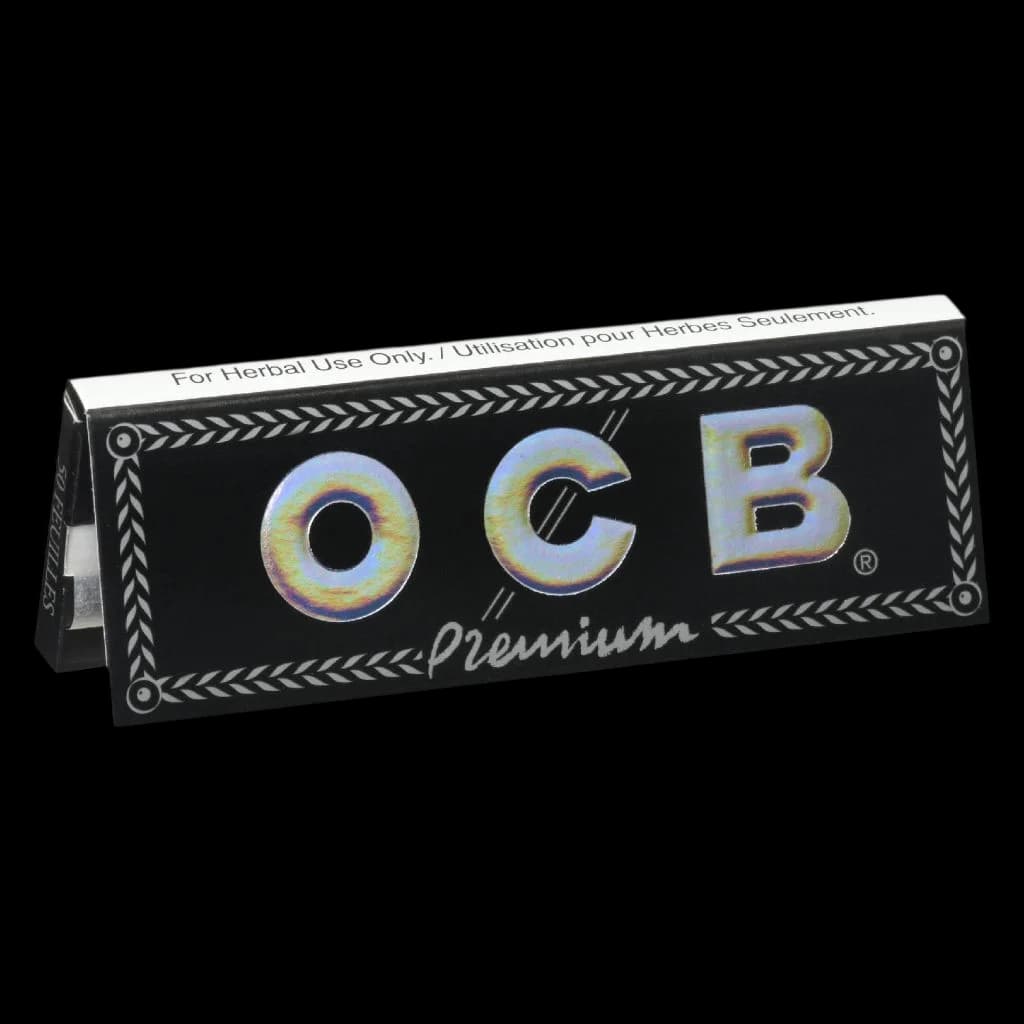 OCB Premium black rolling papers booklet, 1 1/4 size, with silver holographic OCB logo on the front cover