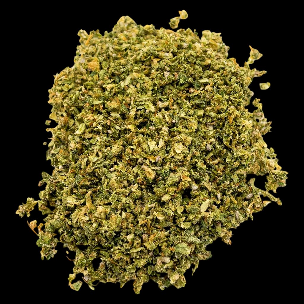 Overtime The Grind cannabis dried flower, loosely chopped texture with green and golden tones