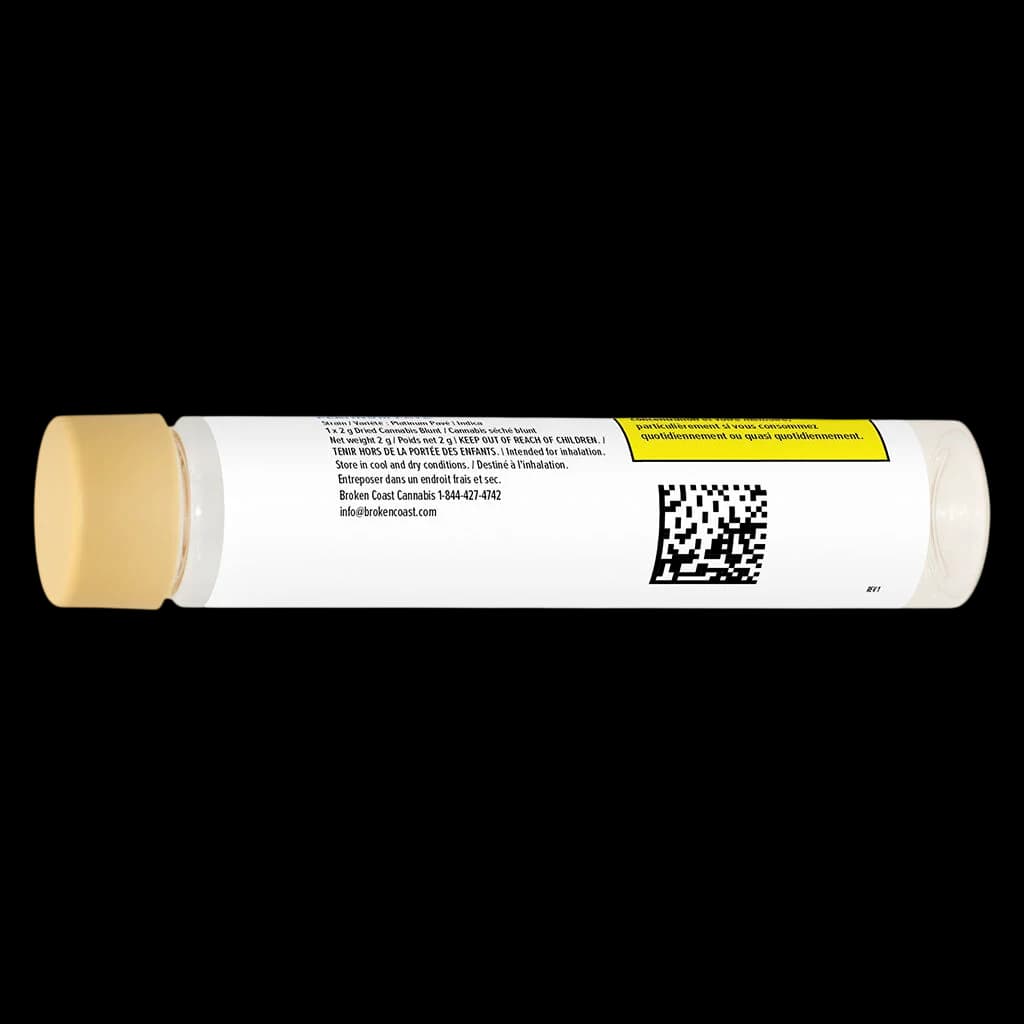 Broken Coast Platinum Pavé Blunt pre-roll tube showing yellow warning label, QR code, and product information