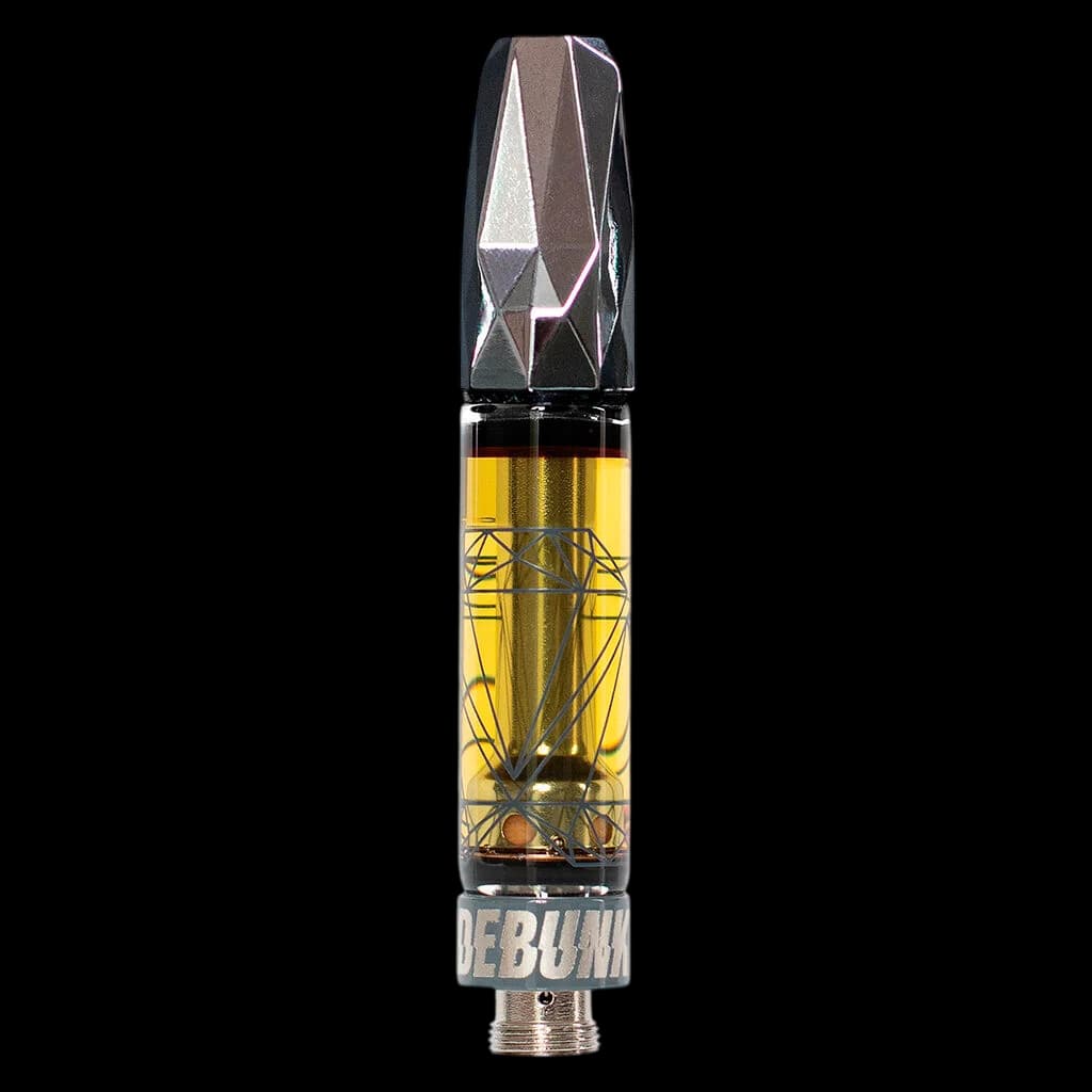 Debunk Uncut Gems Liquid Diamond 510 thread cartridge with yellow concentrate and geometric black cap