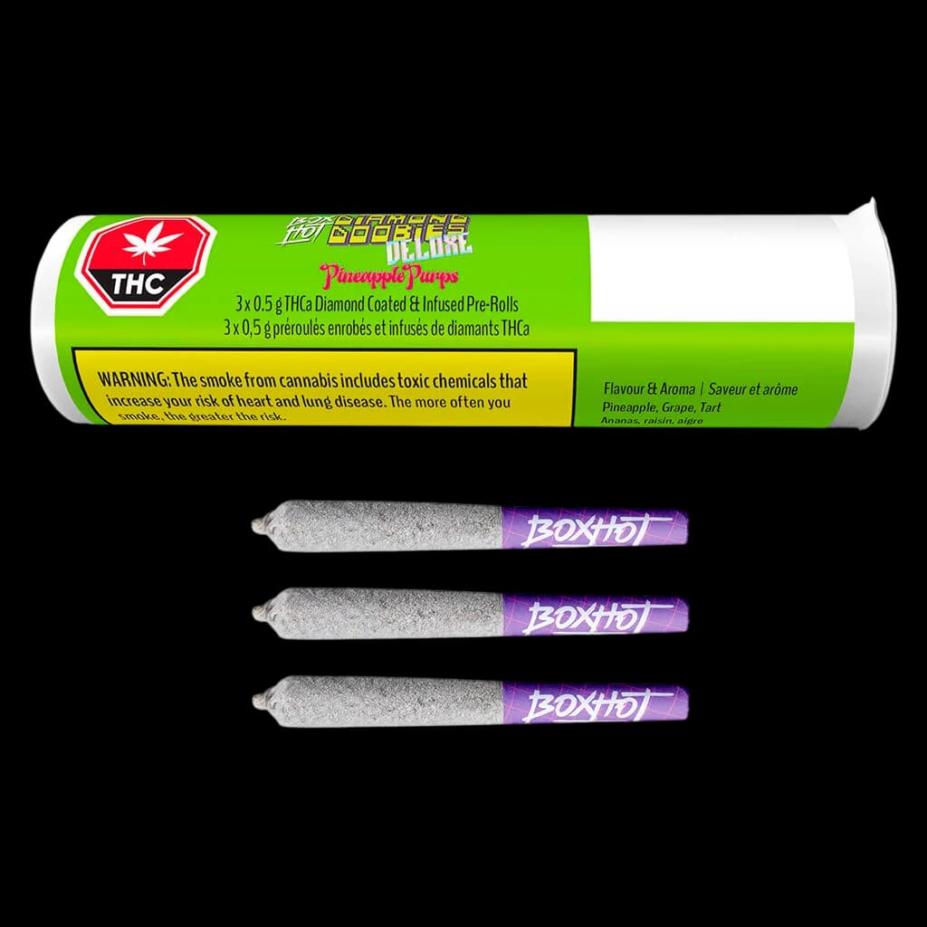 Paquet de Diamond Doobies Deluxe Pineapple Purps comprenant trois pré-roulés de 0,5 g enrobés de diamants de THCa, avec embouts filtres mauves, présenté avec son emballage