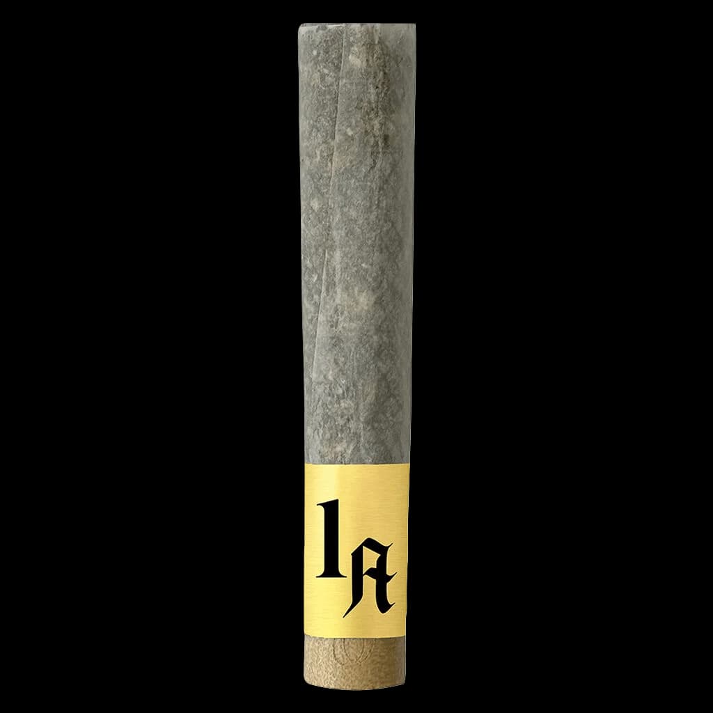 Pré-roulé infusé Hash Hole 1Above avec bande jaune et logo gothique sur tube en papier naturel
