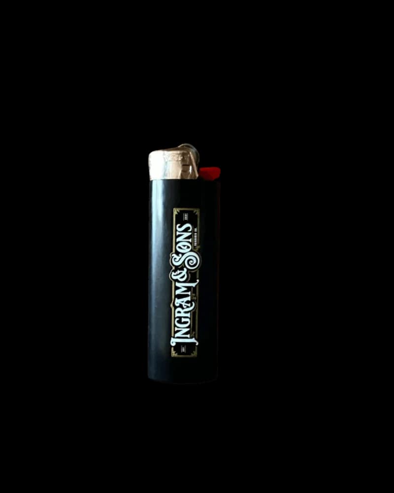 Ingram & Sons BIC lighter with black body, silver top, and red ignition button