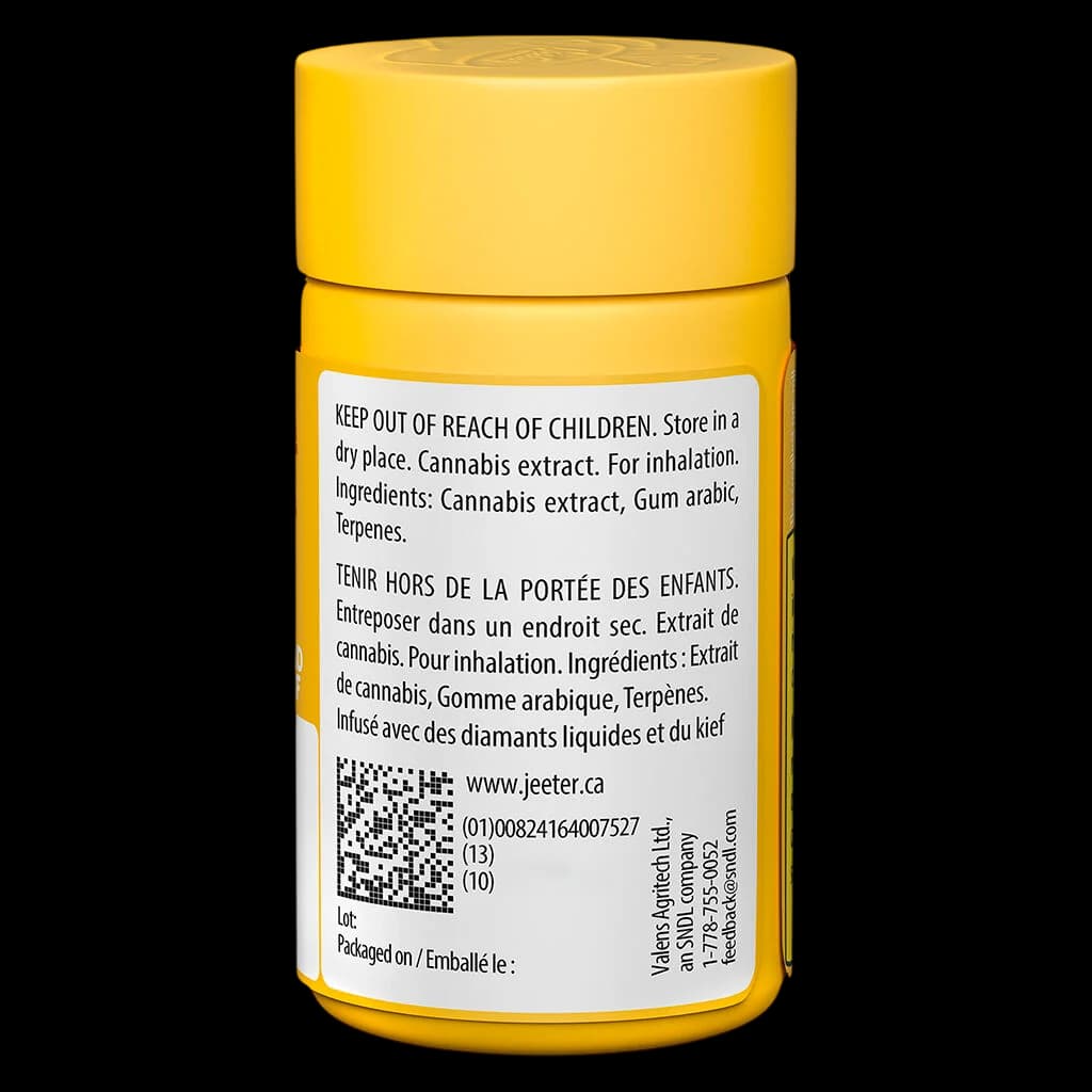 Baby Jeeter cannabis extract vape cartridge in yellow cylindrical packaging with bilingual safety and ingredient label