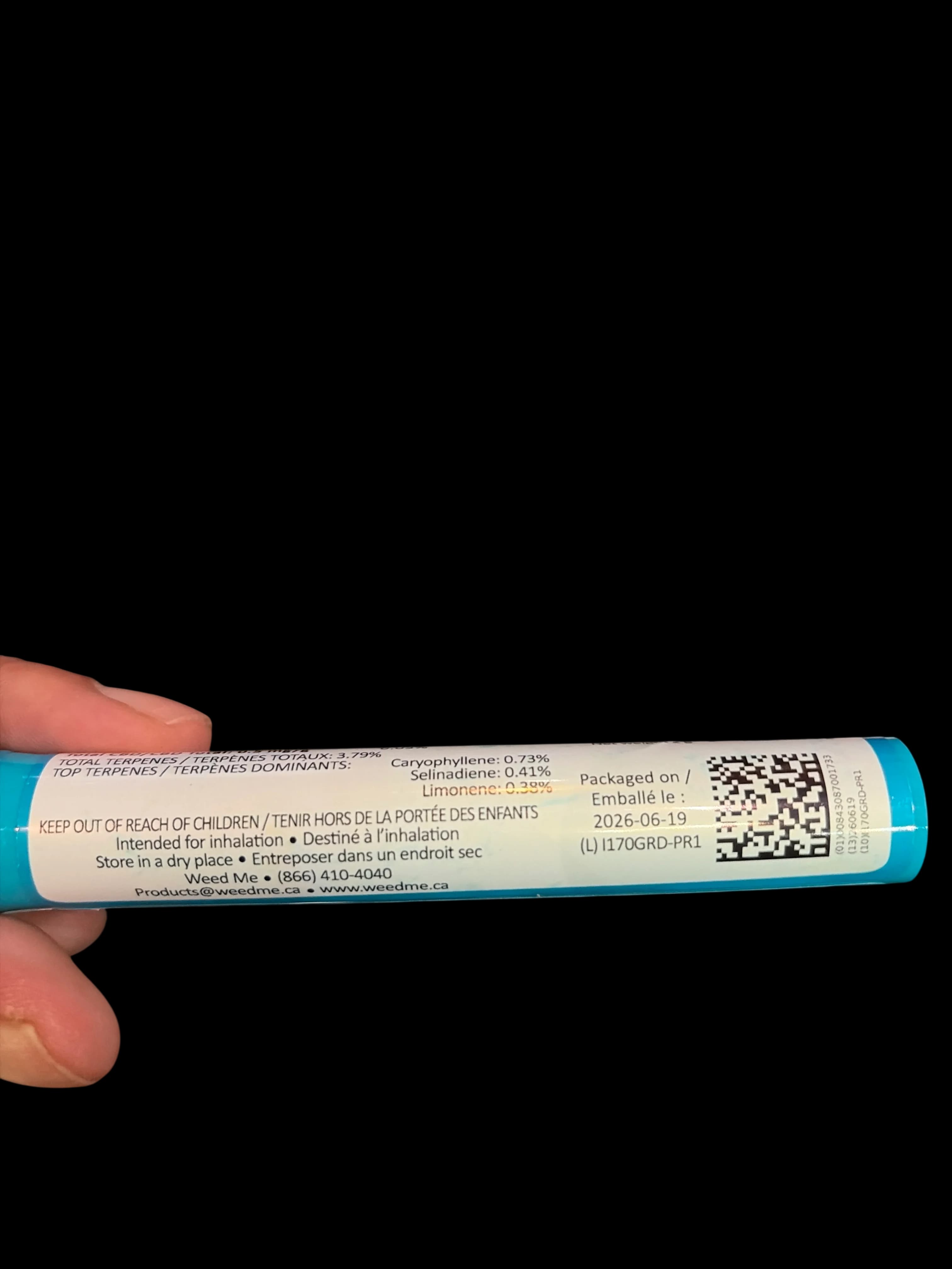 Thumbs Up Sativa pre-roll with natural paper wrapper and cannabis flower visible, two units shown