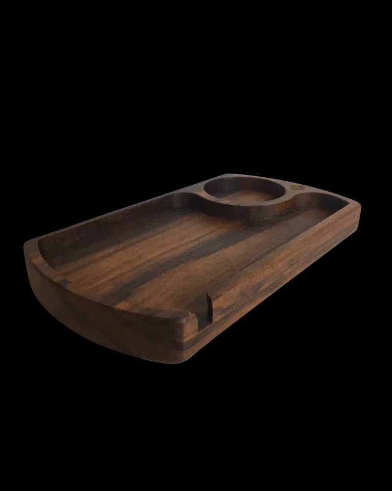 Dark wooden rolling tray with compartments and circular holder for cannabis accessories