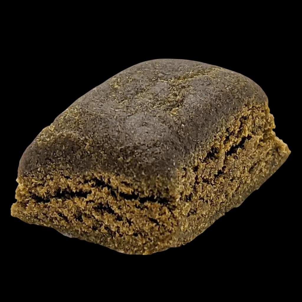HashCo Gold Seal Hash, dense golden-brown cannabis concentrate with textured surface